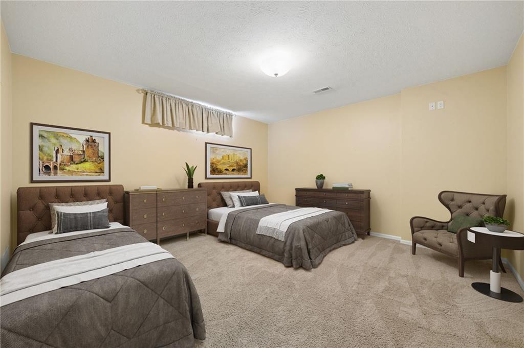 317 Ann Circle Indiana, PA 15701 - Photo 26 of 39 a bedroom with two beds and painting on the wall