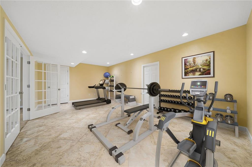 317 Ann Circle Indiana, PA 15701 - Photo 33 of 39 a living room with furniture a window and gym equipment