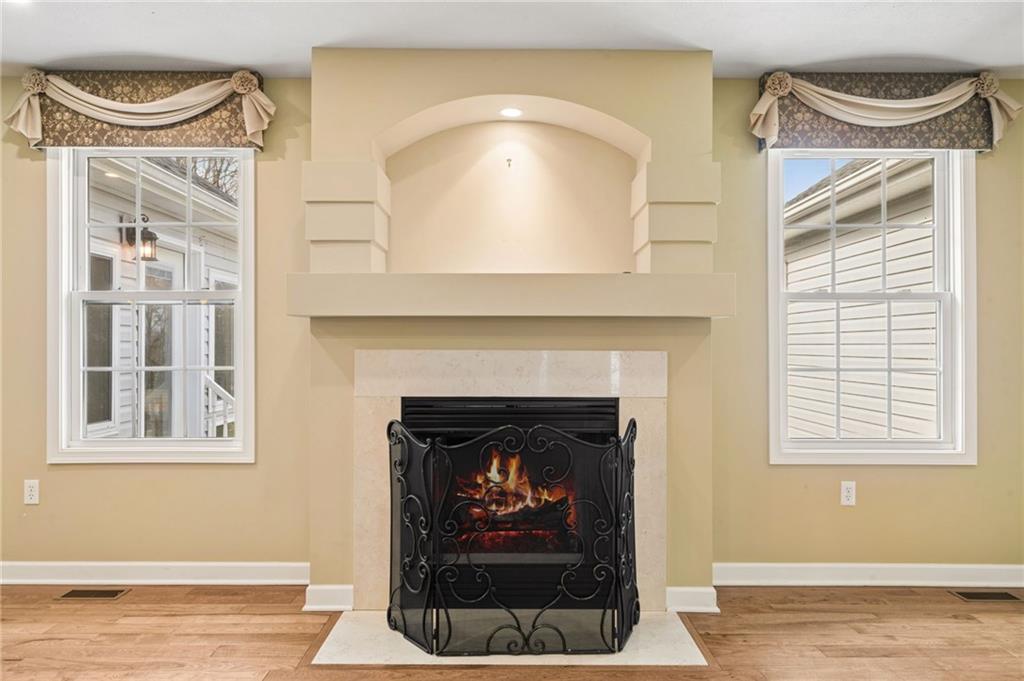 317 Ann Circle Indiana, PA 15701 - Photo 8 of 39 a living room with a fireplace and a window