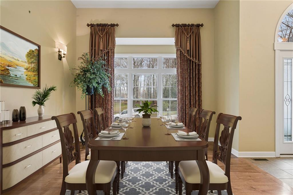 317 Ann Circle Indiana, PA 15701 - Photo 9 of 39 a view of a dining room with furniture window and wooden floor