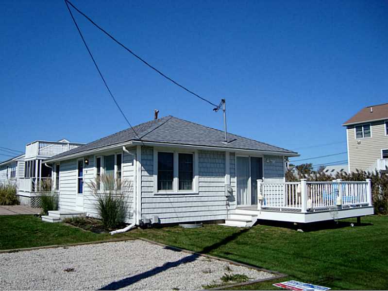 Exterior Front. Charming cottage with shingle look vinyl siding,new windows and doors