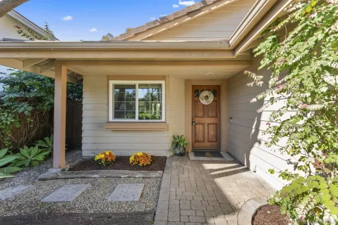 a front view of a house with a yard