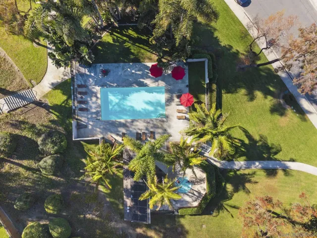 a view of swimming pool with a yard