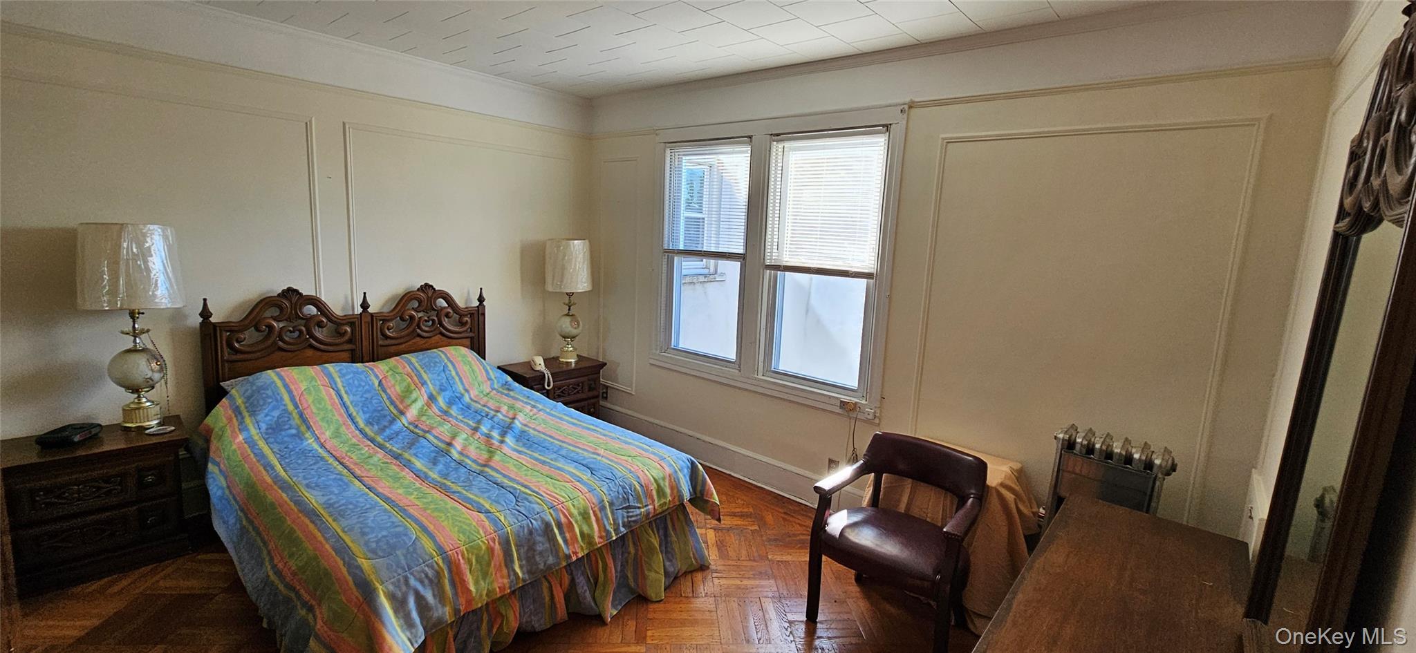 78-54 75th Street Queens, NY 11385 - Photo 19 of 31 Bedroom featuring crown molding