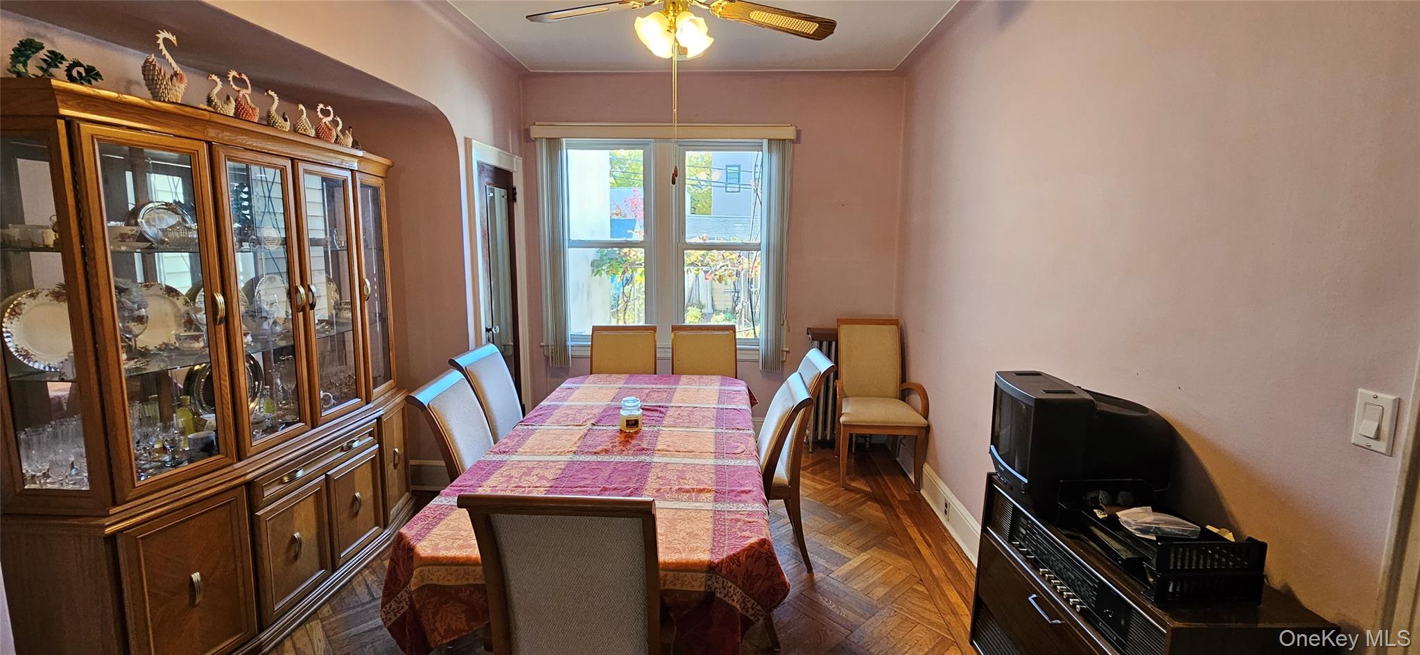 78-54 75th Street Queens, NY 11385 - Photo 5 of 31 Dining room with a ceiling fan and baseboards