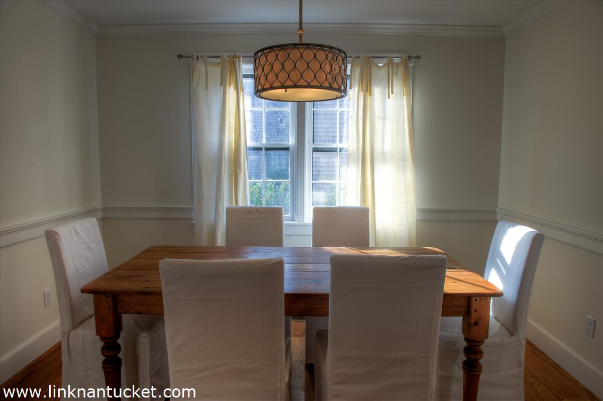 4 Beaver Street Nantucket, MA 02554 - Photo 11 of 19 a view of a dining room with furniture and window