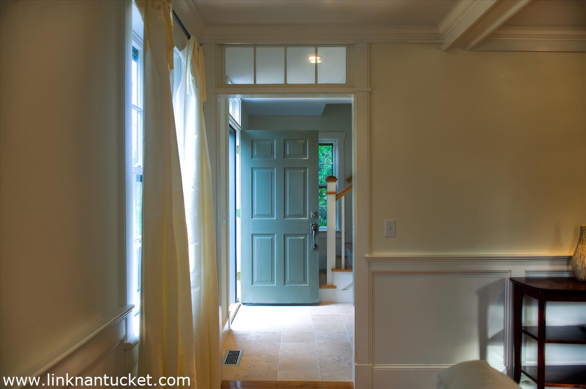4 Beaver Street Nantucket, MA 02554 - Photo 6 of 19 a view of elevator with a glass door and chair