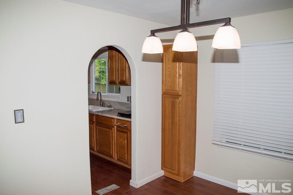 3735 Christopher Circle Reno, NV 89503 - Photo 5 of 19 a view of a bathroom with a sink and mirror