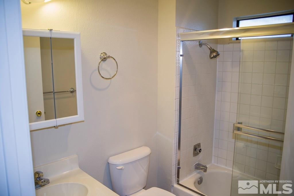 3735 Christopher Circle Reno, NV 89503 - Photo 9 of 19 a bathroom with a toilet and a shower