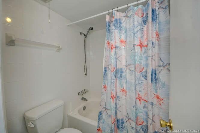 1950 Southwest Palm City Road, Unit 3209 Stuart, FL 34994 - Photo 26 of 64 En suite bathroom.