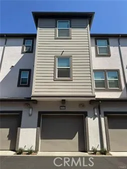 a front view of a house with a garage
