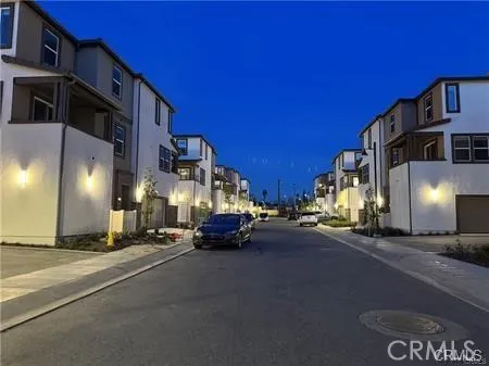 a view of a street with cars