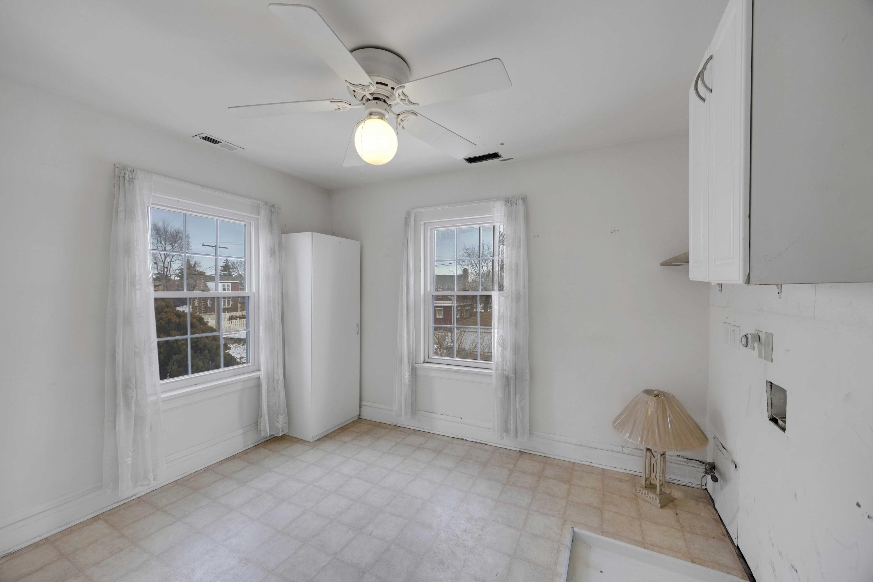 643 McKinley Street Gary, IN 46404 - Photo 12 of 22 a view of an empty room with a window