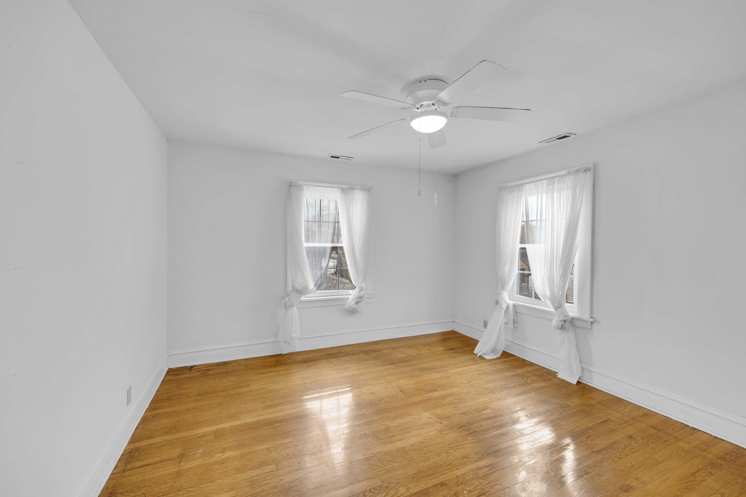 643 McKinley Street Gary, IN 46404 - Photo 14 of 22 a view of an empty room with a window