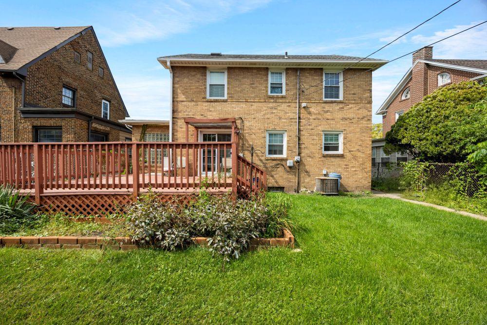 643 McKinley Street Gary, IN 46404 - Photo 22 of 22 a front view of a house with a garden