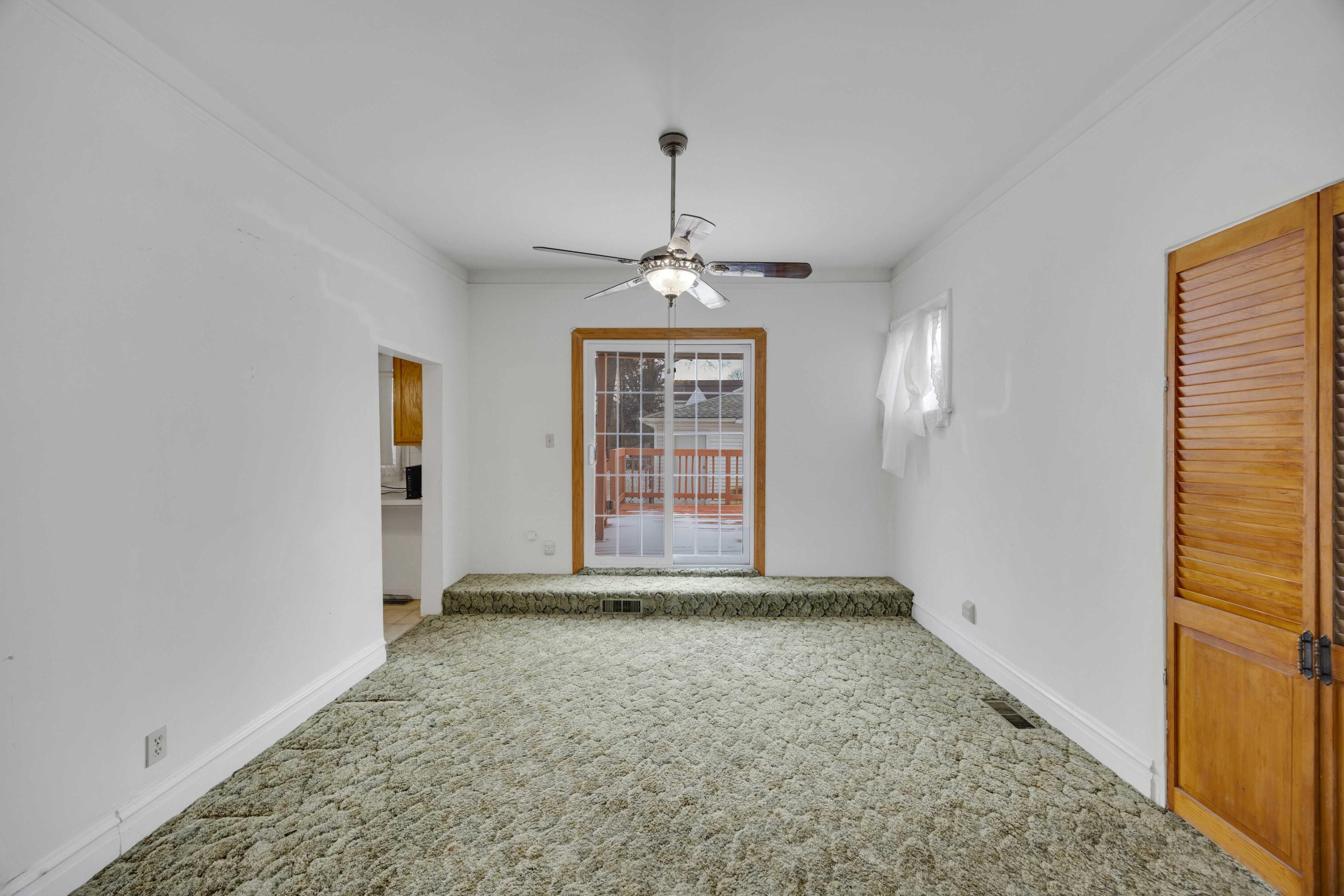 643 McKinley Street Gary, IN 46404 - Photo 5 of 22 an empty room with windows
