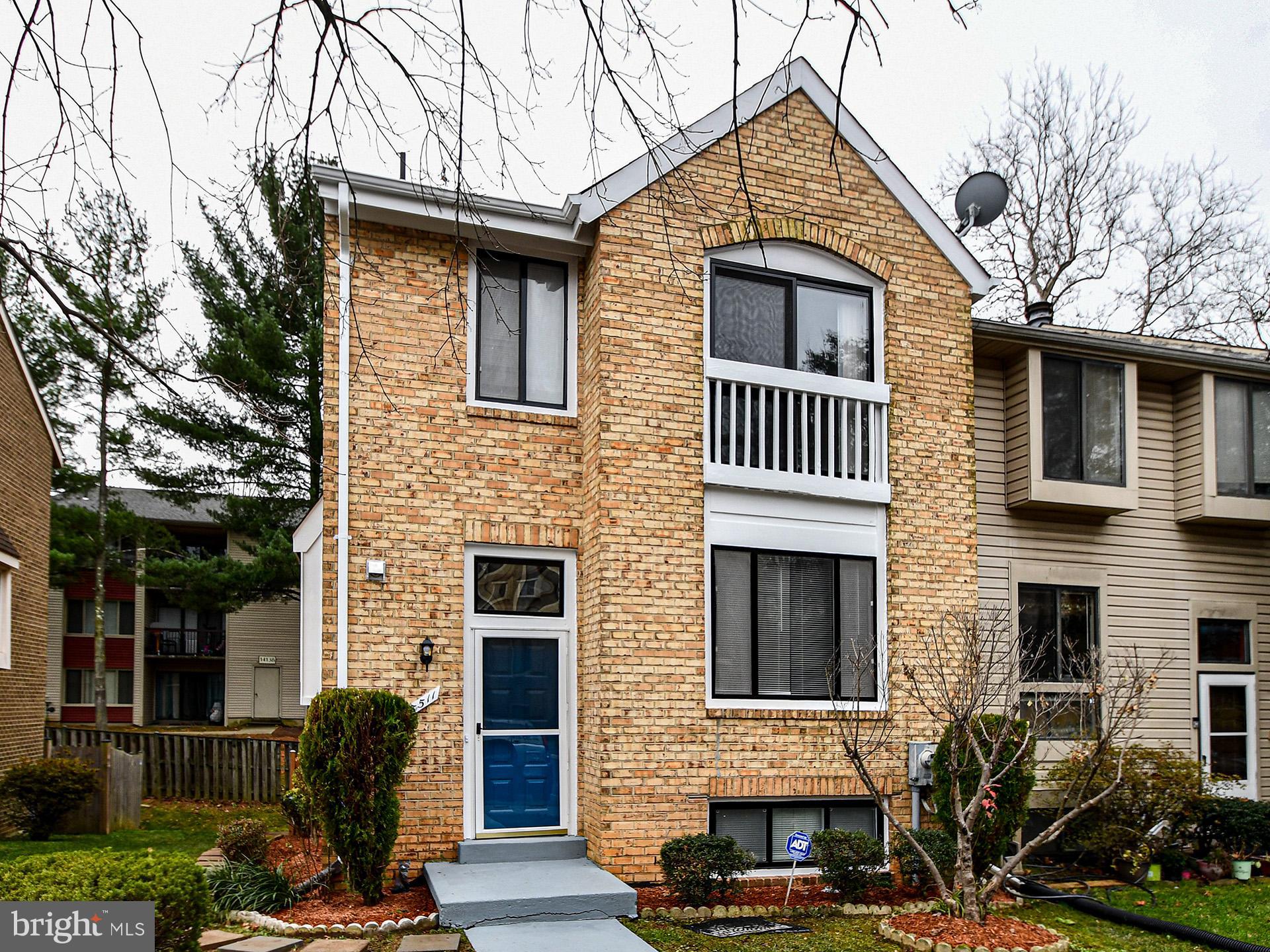3511 Castle Way, Unit 312 Silver Spring, MD 20904 - Photo 2 of 34 a view of a house with a yard and plants