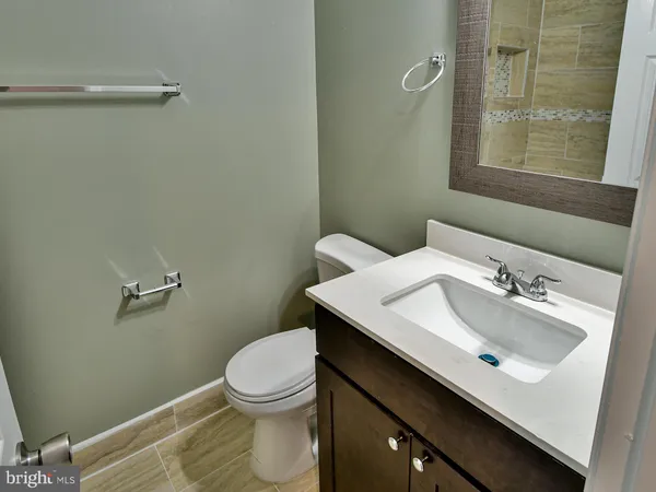 a bathroom with a sink and a toilet
