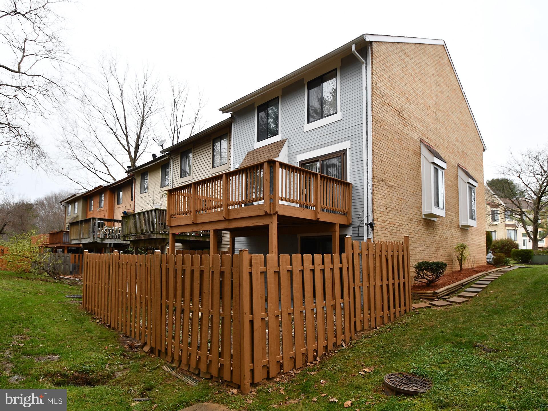 3511 Castle Way, Unit 312 Silver Spring, MD 20904 - Photo 27 of 34 a front view of a house with garden