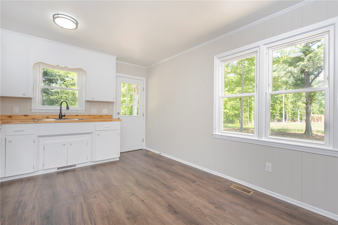 113 Linda Lane Honea Path, SC 29654 - Photo 10 of 36 This bright kitchen offers durable flooring and ample natural light, ideal for everyday living.