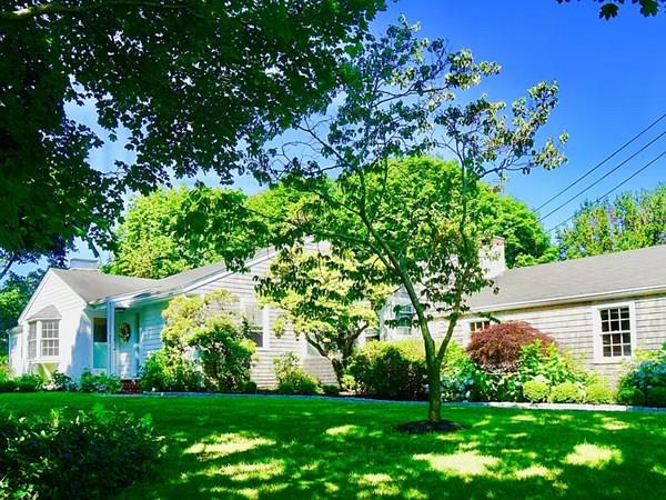 603 Hatherly Road Scituate, MA 02066 - Photo 1 of 19 a front view of a house with a garden
