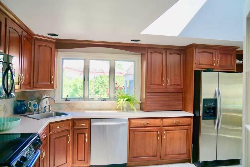 603 Hatherly Road Scituate, MA 02066 - Photo 4 of 19 a kitchen with stainless steel appliances granite countertop a refrigerator and a sink