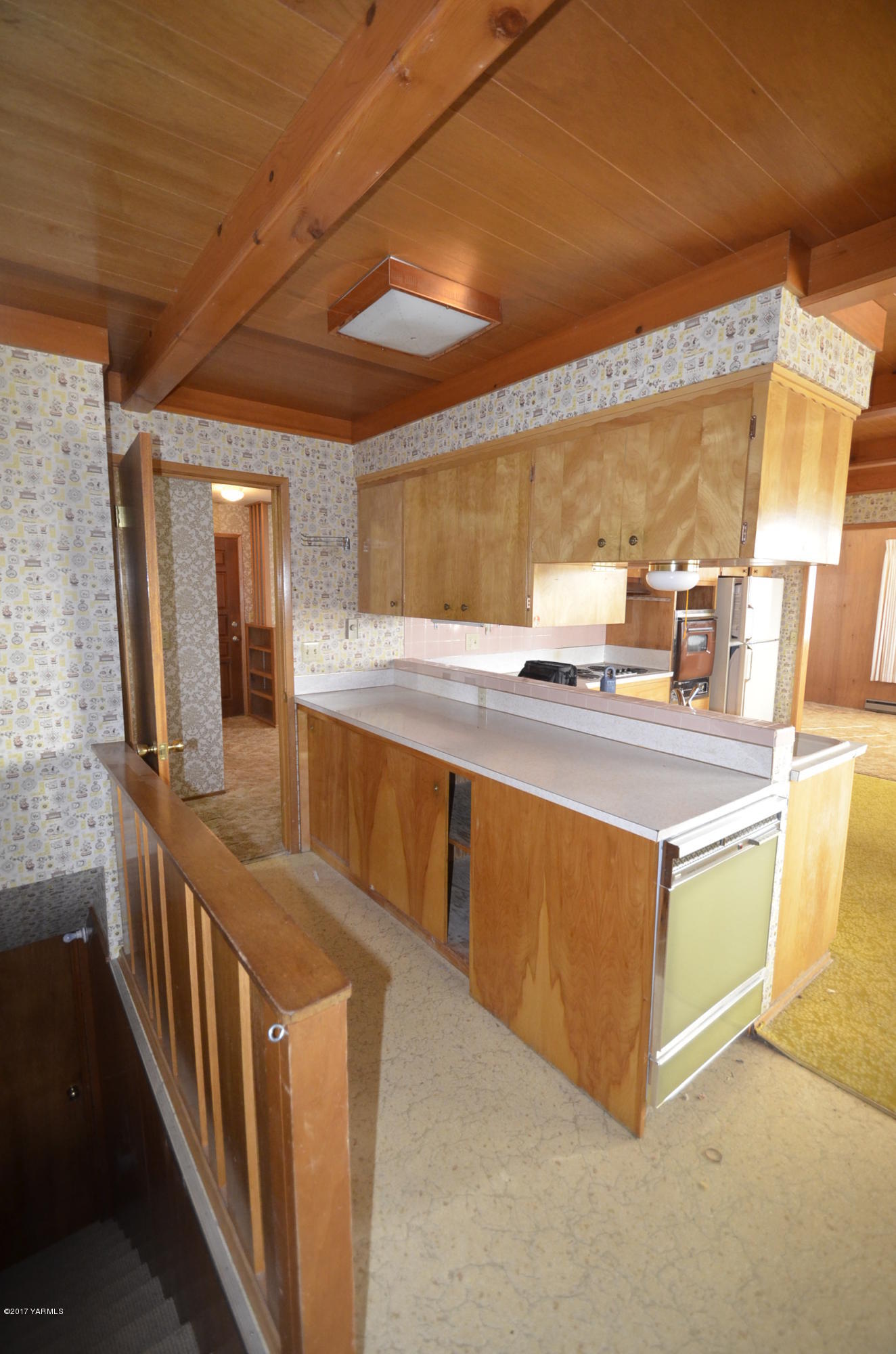 12602 Gilbert Road Yakima, WA 98903 - Photo 5 of 24 a kitchen with stainless steel appliances granite countertop a sink and a stove