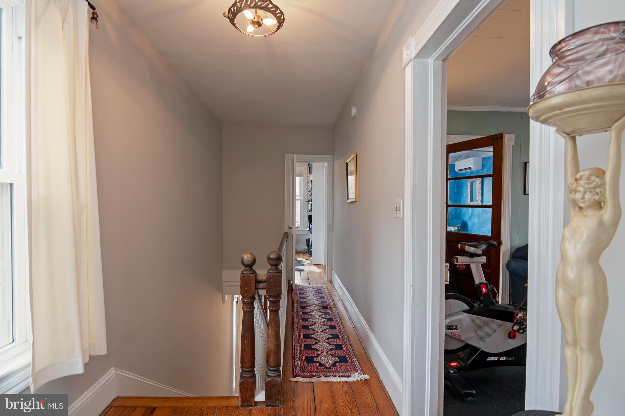 102 Choptank Avenue Cambridge, MD 21613 - Photo 11 of 23 a view of a hallway with wooden floor and entryway