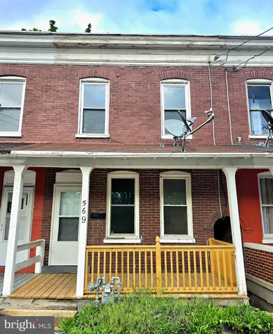 a front view of a house with windows
