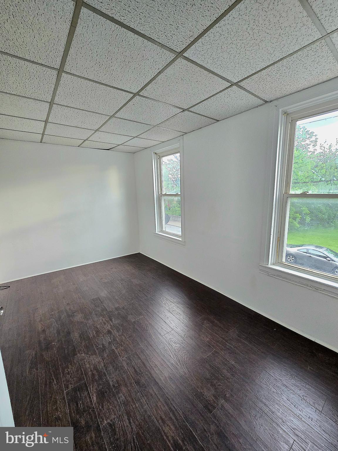 569 Smith Street York, PA 17404 - Photo 13 of 16 a view of a room that has wooden floor and brick walls