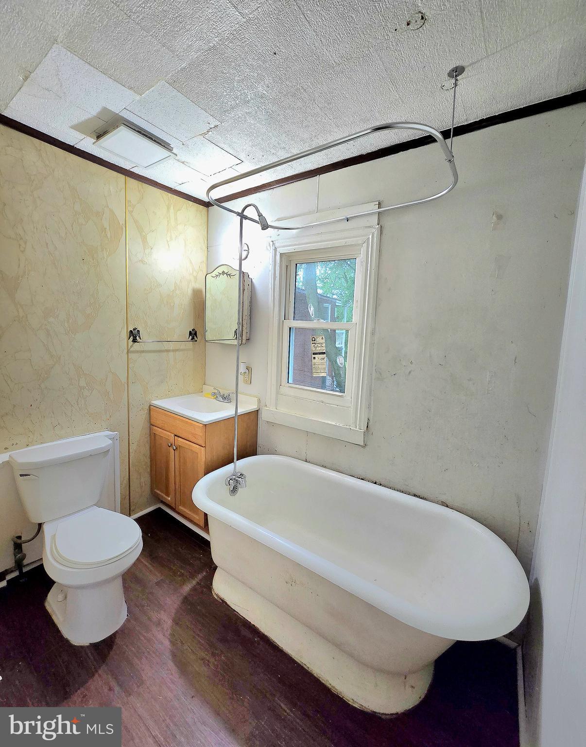 569 Smith Street York, PA 17404 - Photo 16 of 16 a white bath tub sitting next to a white toilet