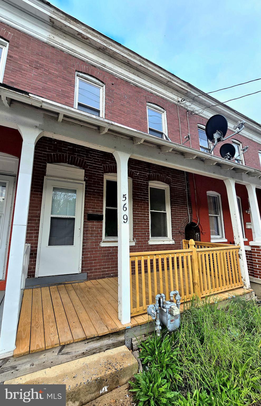 569 Smith Street York, PA 17404 - Photo 2 of 16 a front view of a house with garage