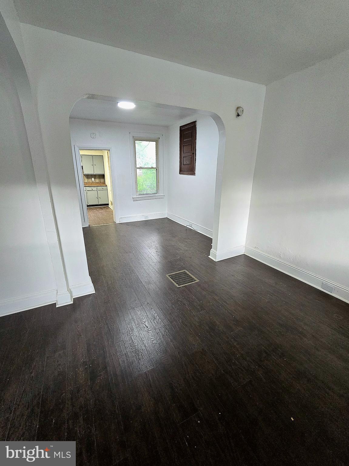 569 Smith Street York, PA 17404 - Photo 5 of 16 a view of a livingroom with wooden floor and a window