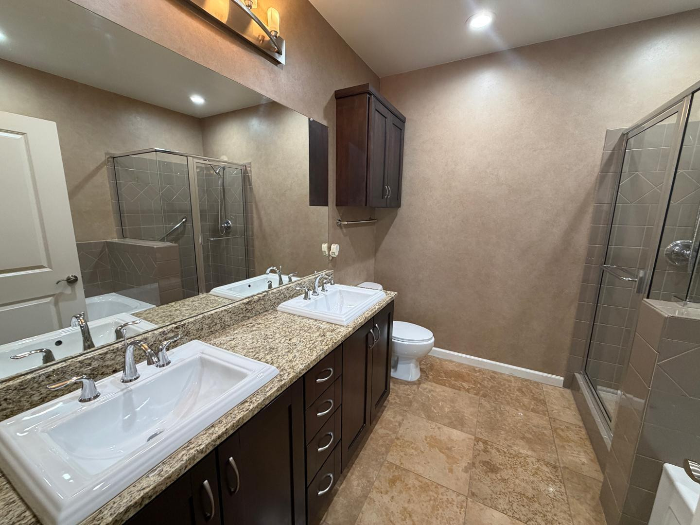7291 North Scottsdale Road, Unit 1001 Paradise Valley, AZ 85253 - Photo 16 of 34 a bathroom with a sink double vanity granite and a mirror