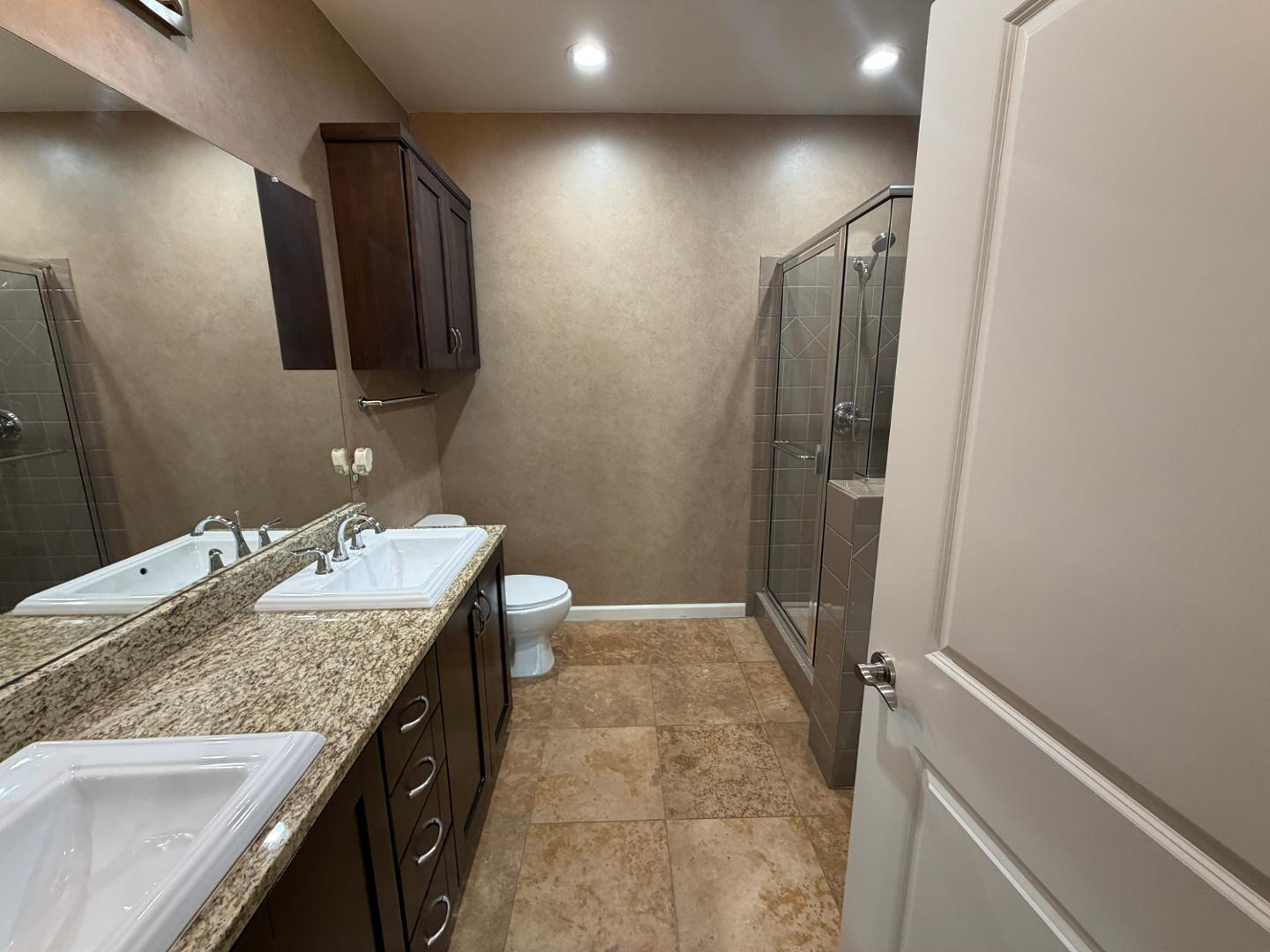 7291 North Scottsdale Road, Unit 1001 Paradise Valley, AZ 85253 - Photo 22 of 34 a bathroom with a granite countertop sink and a mirror