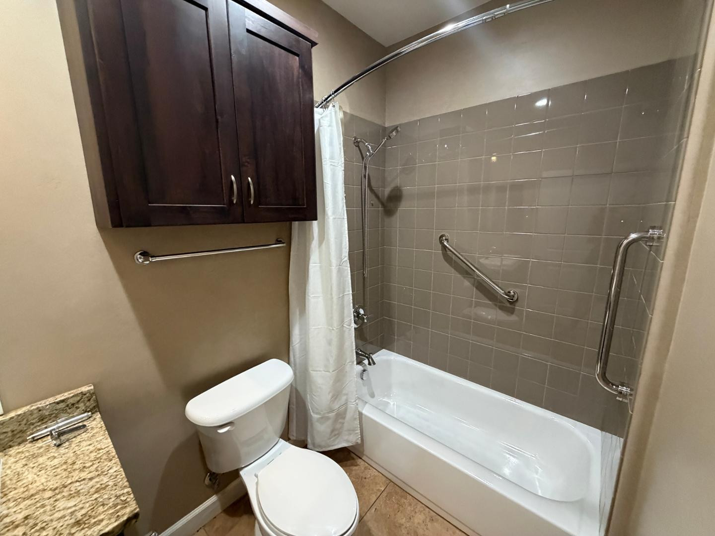7291 North Scottsdale Road, Unit 1001 Paradise Valley, AZ 85253 - Photo 26 of 34 a bathroom with a toilet and a shower