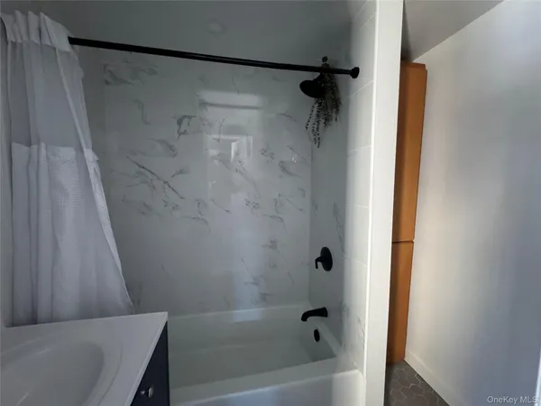 a bathroom with a bathtub