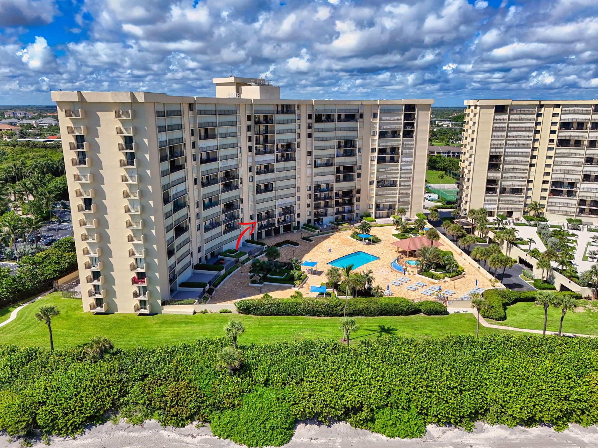 100 Ocean Trail Way, Unit 305 Jupiter, FL 33477 - Photo 31 of 53 a view of building with yard and entertaining space
