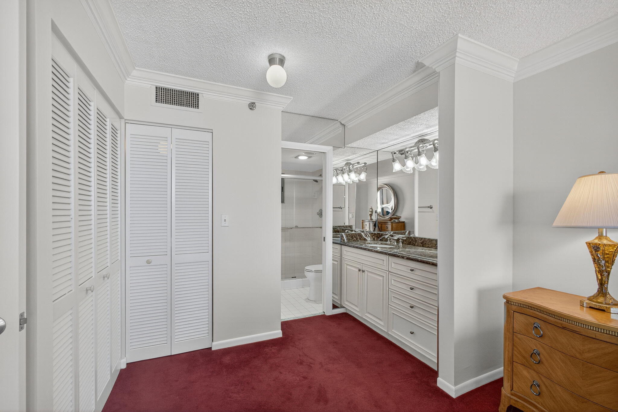 100 Ocean Trail Way, Unit 305 Jupiter, FL 33477 - Photo 10 of 53 a kitchen with granite countertop a sink and a stove