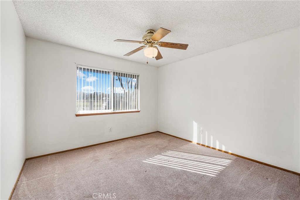 10837 East Ave R 10 Littlerock, CA 93543 - Photo 28 of 50 a view of an empty room with a window