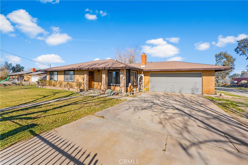 10837 East Ave R 10 Littlerock, CA 93543 - Photo 3 of 50 a view of a house with a swimming pool