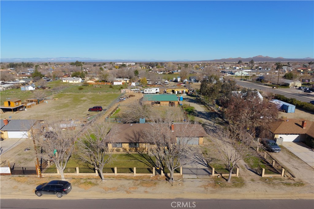 10837 East Ave R 10 Littlerock, CA 93543 - Photo 47 of 50 an aerial view of residential houses with outdoor space