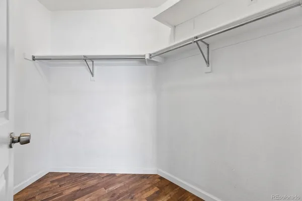 a view of a room with racks on the wall