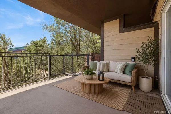 a view of a balcony with couch