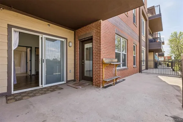 a view of a house with a barbeque