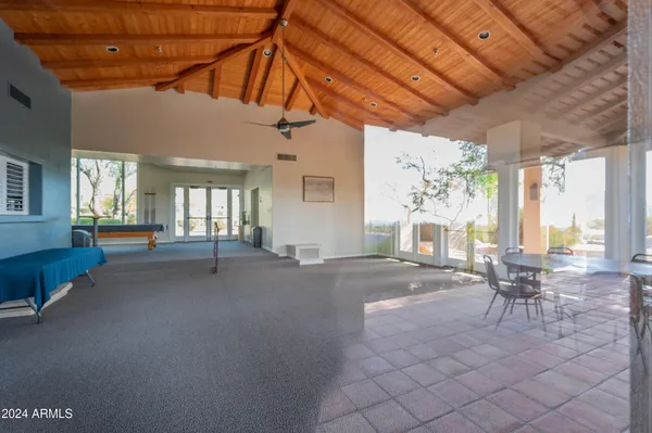a view of a lobby with furniture and floor to ceiling window