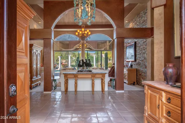 a view of a city with tall trees