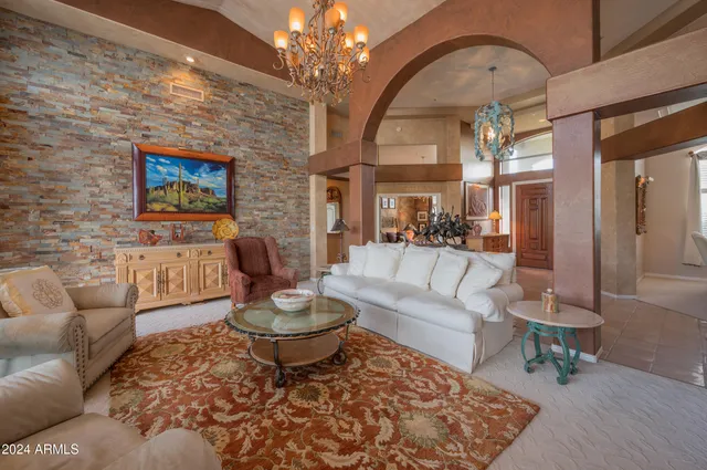 a kitchen with stainless steel appliances granite countertop a stove and a refrigerator