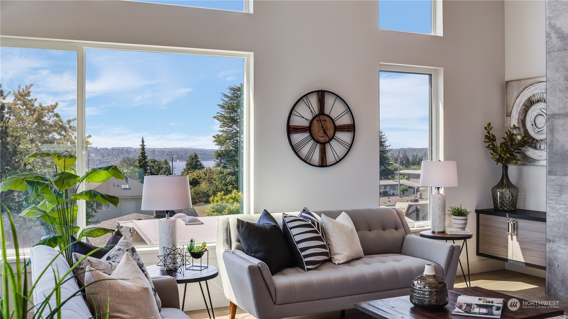 1907 Northeast 14th Street Renton, WA 98056 - Photo 8 of 40 a living room with furniture a clock and a window