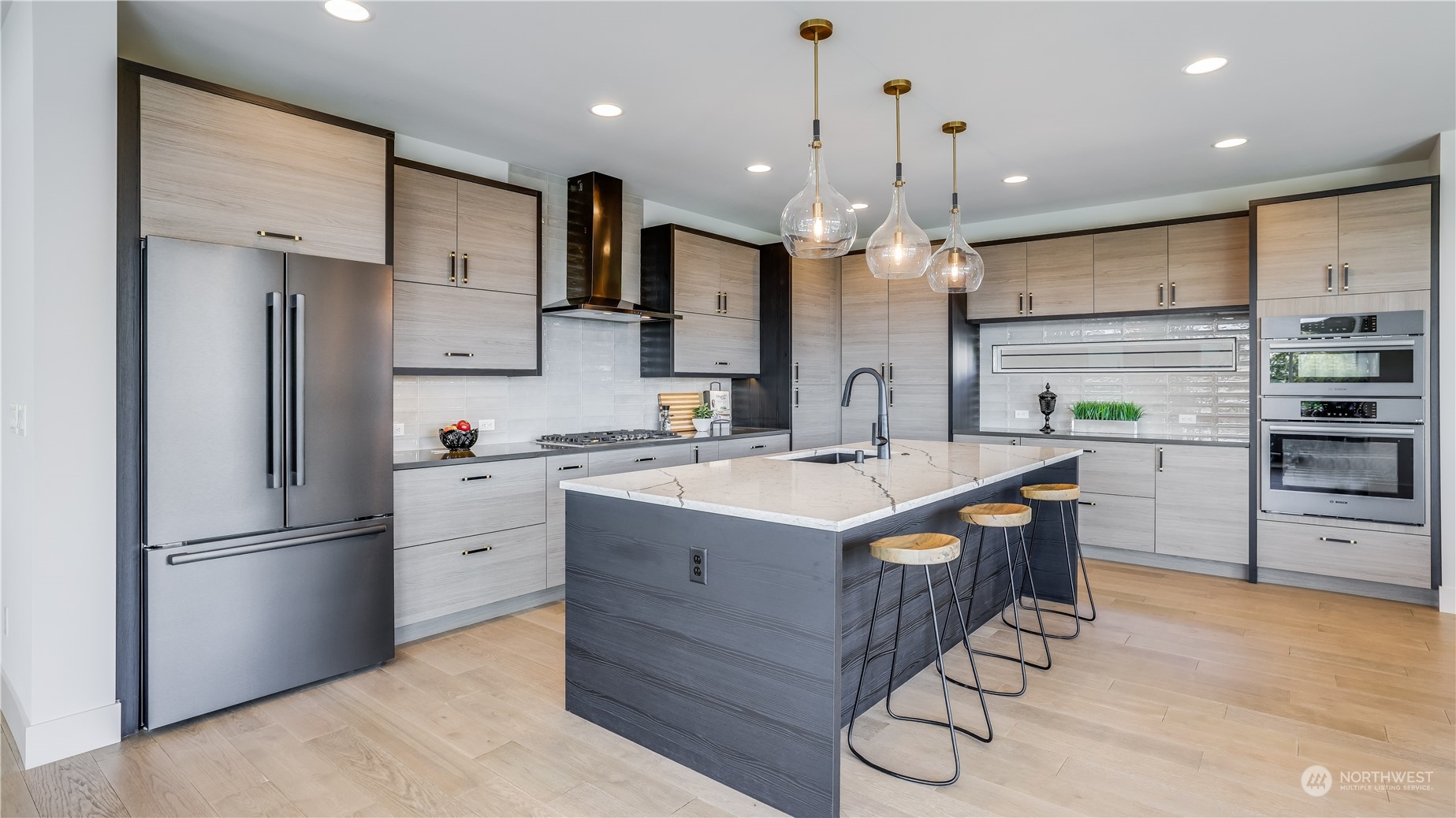 1907 Northeast 14th Street Renton, WA 98056 - Photo 9 of 40 a kitchen with a sink stainless steel appliances and cabinets